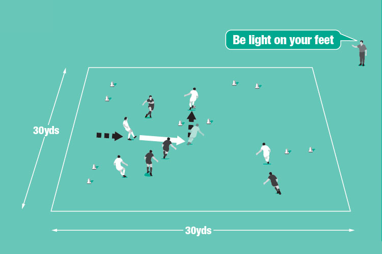 Play 4v4. Players score by dribbling the ball through a coned goal.