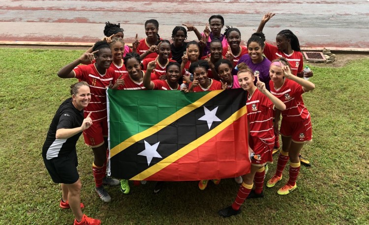 Jené with her Saint Kitts and Nevis players